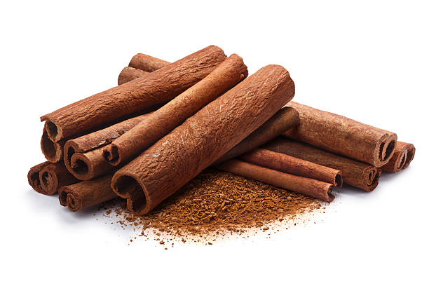 istock Pile of cinnamon in sticks and ground, paths 629941150