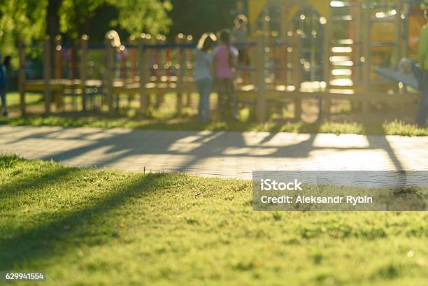 Defocused And Blurred Image For Background Childrens Playground Public Park Stock Photo - Download Image Now