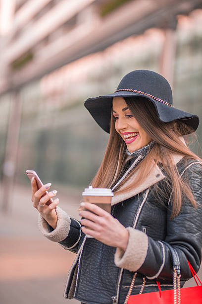 istock Business woman texting on her phone. 629942072