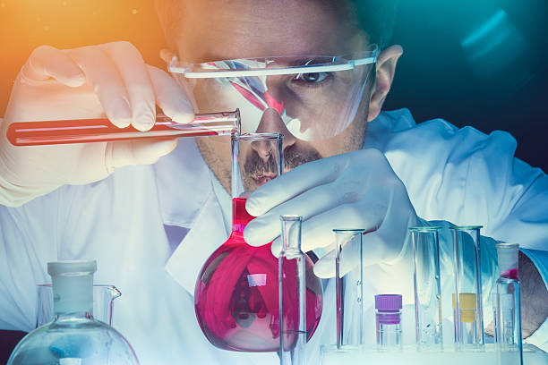 Laboratory Chemist working at the laboratory chemistry stock pictures, royalty-free photos & images