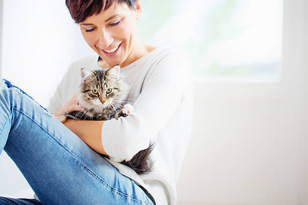 istock Happy Woman Portrait with her Cat 629943128