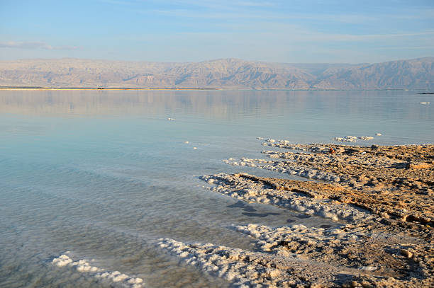 istock Dead Sea and the coast, lit by the sun 629944272