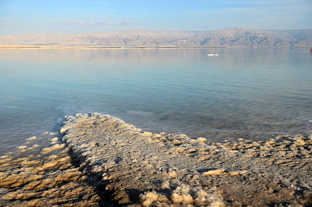 istock Dead Sea and the coast, lit by the sun 629944404