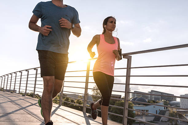 istock woman and man running 629953268