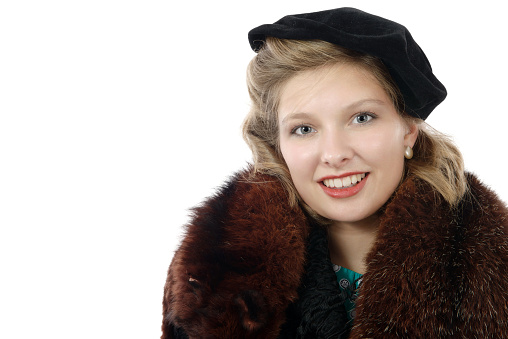 Portrait of a beautiful smiling woman with vintage clothes