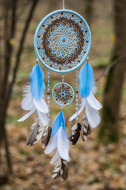 istock Dreamcatcher made of feathers, leather, beads, and ropes 629955570