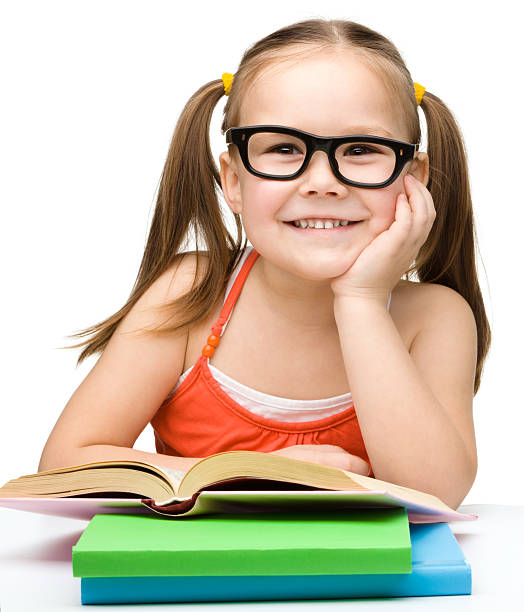 istock Little girl is reading a book 629955578