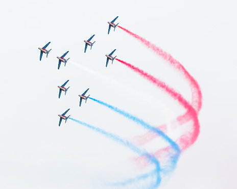 Leeuwarden, the Netherlands - June 11, 2016: Pilots of Patrouille de France perform acrobatics at the Dutch Airshow on June 11, 2016 at Leeuwarden Airfield, The Netherlands.