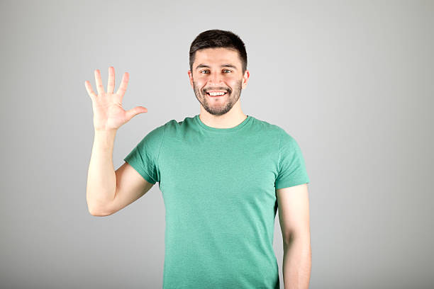 istock Man showing number by fingers 629959930