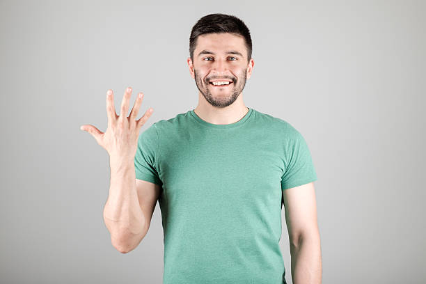 istock Man showing number by fingers 629960418