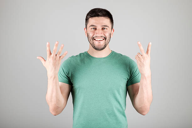 istock Man showing number by fingers 629960506