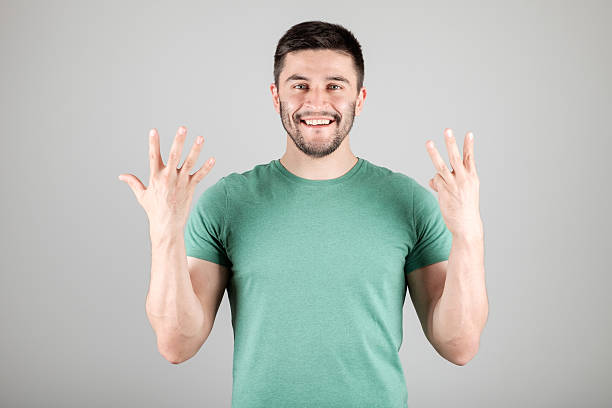 istock Man showing number by fingers 629960540