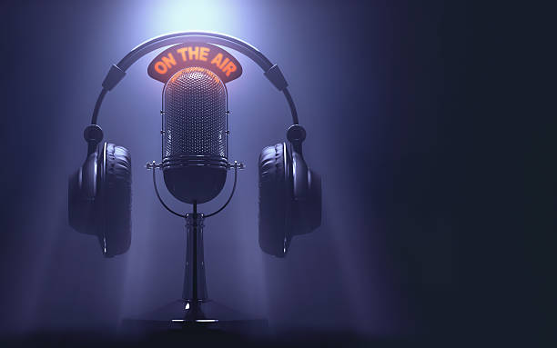 On The Air Headset on the microphone with the "On The Air" light on. radio broadcasting photos stock pictures, royalty-free photos & images
