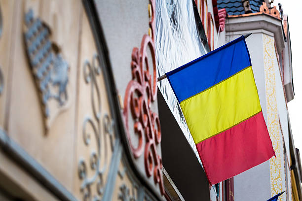 istock Close up of Romanian Flag attached to a building 629962532