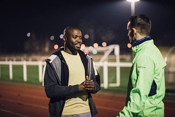 istock Socialising on the Running Track 629962758