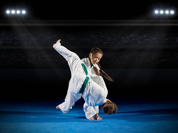 children martial arts fighters - karate judo belt aikido imagens e fotografias de stock