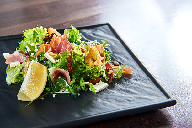 istock Arugula and prosciutto salad served at the restaurant 629964932