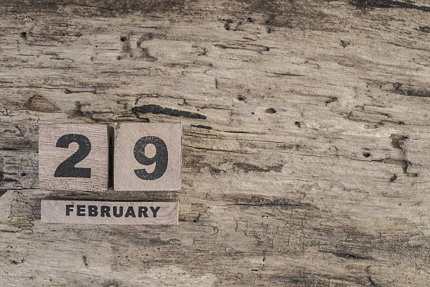 istock cube calendar for february on wooden background 629985276
