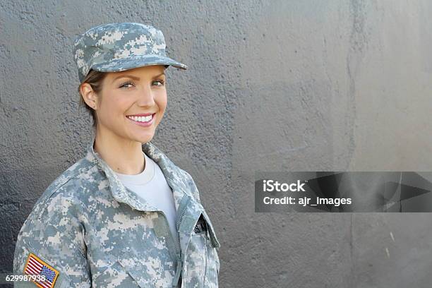 Smiling Female Soldier Standing With Copy Space Stock Photo - Download Image Now - Veteran, Females, Armed Forces