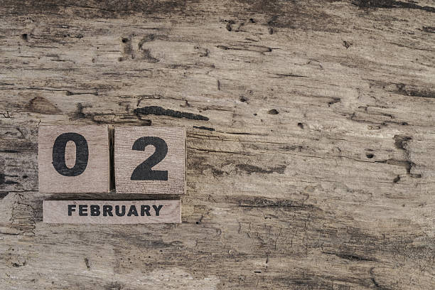 istock cube calendar for february on wooden background 629994270