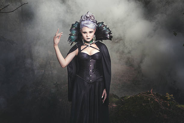istock Woman witch smoke. 629994778