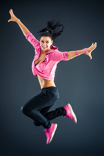 istock Beautiful urban dancer jumping 629994944