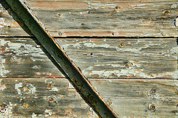 istock Iron and wood oak plank background 629998106