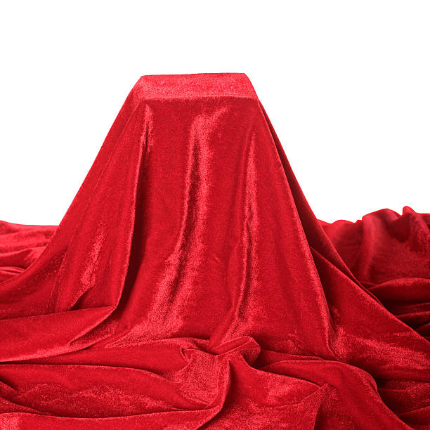 istock red velvet pedestal on white 629998558