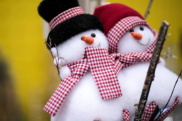 istock snow man couple 629999564