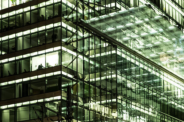 istock office building facade at night -city lights 629999612