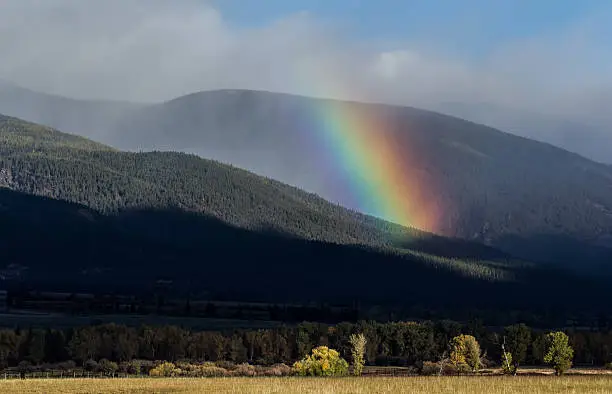Rainbow on the Bitterroot Range during a Fall storm in Montana