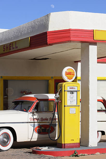 COLYFORD, DEVON, UK- MARCH 16, 2020: Vintage petrol filling station in village of Colyford, Devon, was built in 1927-8. Shell provided petrol to the station using 1950s Avery Hardoll pumps.
