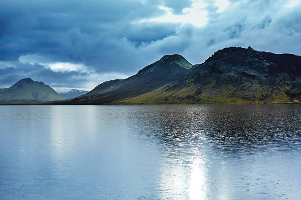 istock Lake coast with mountain reflection, Iceland 630010070