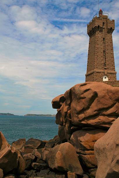 istock Ploumanach lighthouse in brittany , france 630016154