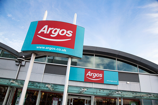 Bristol, UK: December 14, 2016: Argos store front with the website on the commercial sign. Argos is a British catalogue and shop retailer operating in the United Kingdom and Ireland, and a subsidiary of Sainsbury's.