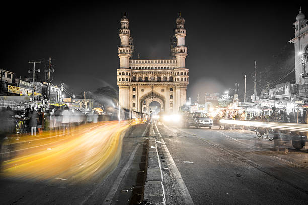 Charminar Mosque in Hyderabad, India The Charminar Mosque sits in the city center of Hyderabad and is one of Inida’s most recognized structures. Tuk tuks and hand drawn cart zoom through the markets and street side restaurants. Tourists can climb to the top of the mosque and get a sweeping view of India’s 5th largest city. hyderabad india stock pictures, royalty-free photos & images