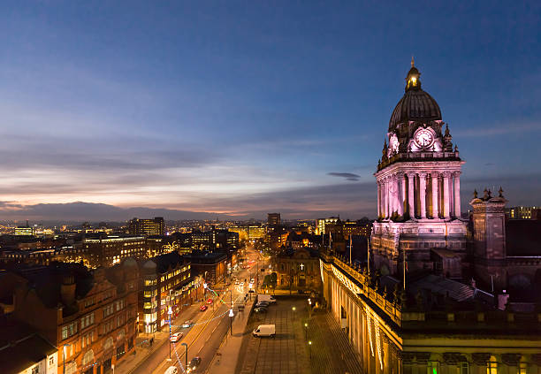 Leeds Town Hall and panoramic night view of skyline