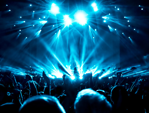 Silhouettes of crowd at a rock concert