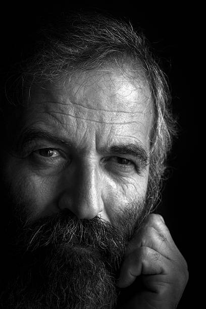 istock Portrait of thoughtful man looking away 630038858