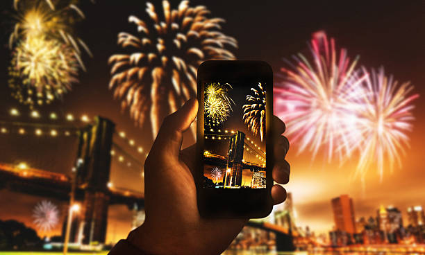 smartphone take a pic of the nyc celebration