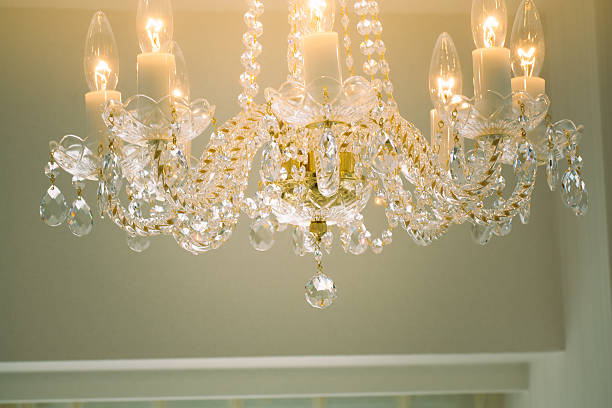 istock Crystal glass glittering chandelier,cross processed colors. 630048862