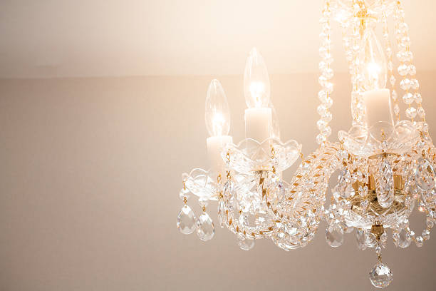 istock Crystal glass glittering chandelier,cross processed colors. 630049150