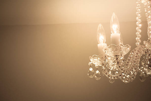 istock Crystal glass glittering chandelier,cross processed colors. 630049214