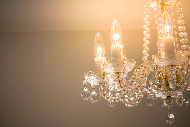 istock Crystal glass glittering chandelier,cross processed colors. 630049282