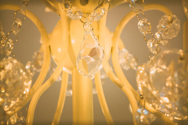 istock Crystal glass glittering chandelier,cross processed colors. 630050318