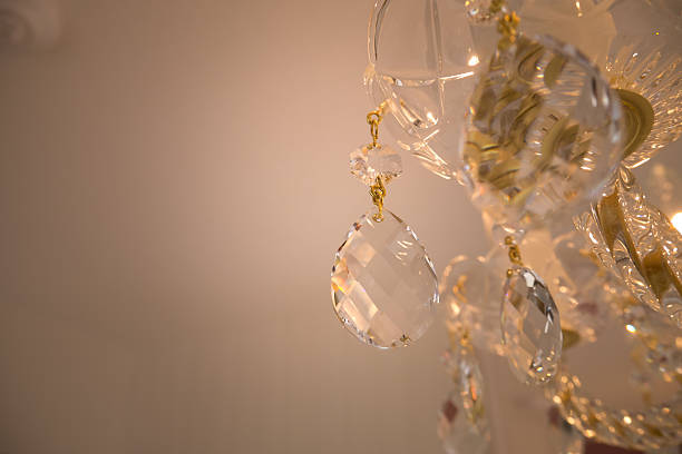 istock Crystal glass glittering chandelier,cross processed colors. 630050916