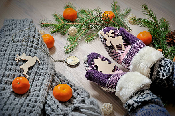istock wooden Christmas figures in hand 630051484