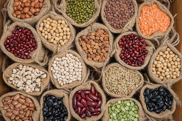 istock Various dry legumes in a sack cloth, Different dry legumes 630051584