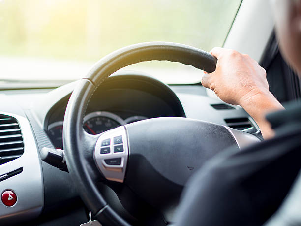 istock man drive a car to work in the morning. 630053146