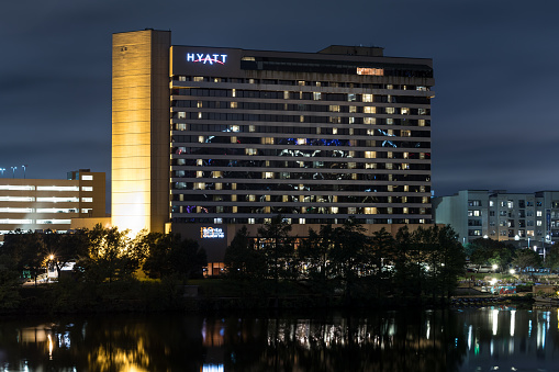 Austin, USA - November 6, 2016: The Hyatt Regency Hotel at night located in Austin, Texas, USA.  Hyatt Hotels Corporation is an American multinational owner, operator, and franchiser of hotels, resorts, and vacation properties.